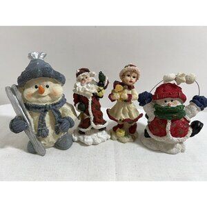 Lot of 4 Vintage Christmas Resin Figurines 4” Santa Snow Man Caroler